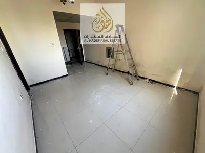 Studio for rent in Ajman Al Nuaimiya 2. Prime location near King Faisal & Kuwait Street, central AC, semi-separated kitchen. Rent AED 18,000 yearly in