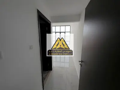 Two-bedroom apartment with a living room in Al Hamidiya 1, Ajman. Two master bedrooms, 3 bathrooms, balcony, central AC, gym, pool, and parking includ