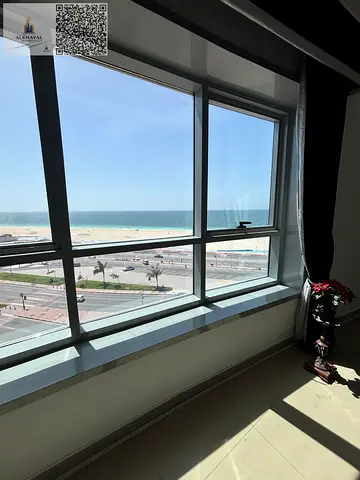 Spacious 3-bedroom apartment with maid’s room in Corniche Tower, partial view, prime location, ideal for families, available for yearly rent with only 2 payments