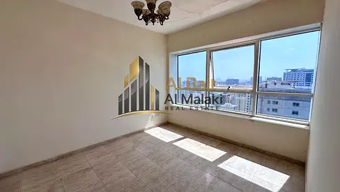 Two-bedroom apartment with parking, swimming pool, air conditioning, and free gym access.