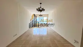 Two-bedroom apartment with parking, swimming pool, air conditioning, and free gym access.