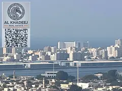 A spacious 3-bedroom apartment with a maid's room and a balcony offering open and varied views i