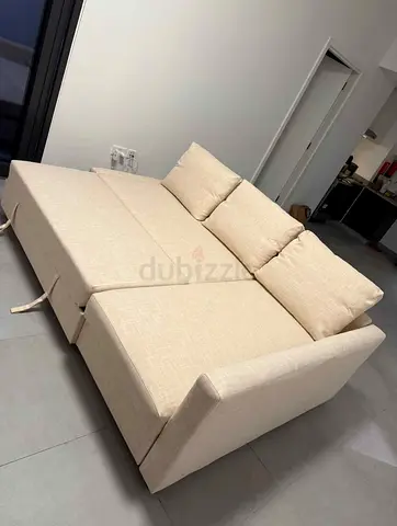 Beige Sofa Bed with Storage — Good Condition