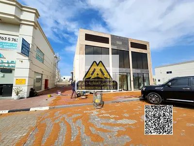 For Sale: A prime commercial property in Al Zahia Main Market. A strong investment opportunity in a vibrant location with bustling commercial activity