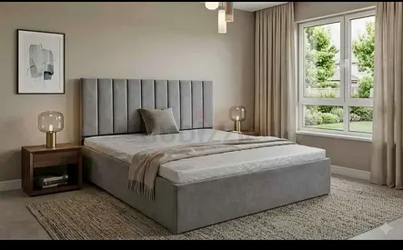 Grey upholstered double bed with storage and tall channel headboard180/200