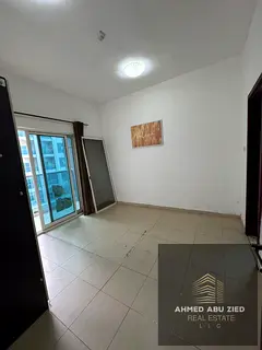 For rent in Ajman, Al Nuaimiya 3, City Towers: one bedroom, living room, two bathrooms, balcony, and