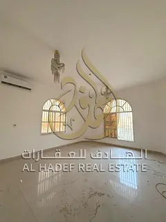 A well-designed villa for rent in Wasit Al Qouz, Sharjah, consisting of two floors, offering a spaci