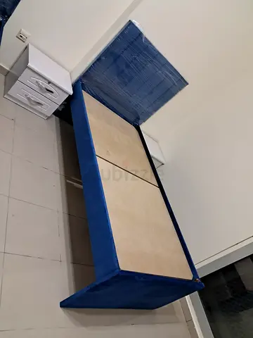 Single blue upholstered bed frame with headboard (single size)