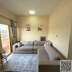 One-bedroom apartment with a living room, fully furnished with elegant and tidy furniture, available
