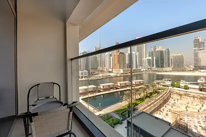 Modern 1BR | Canal  Burj View | Infinity Pool | Ready to Move In