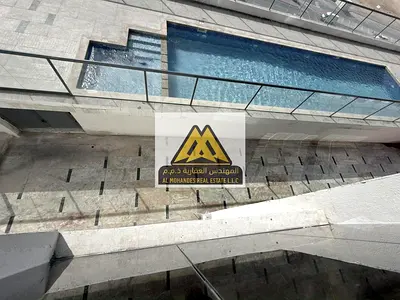 شقة غرفتين وصالة للإيجار في الحميدية 1 عجمان شارع الشيخ عمار 3 حمامات غرف ماستر بلكونة إطلالة مميزة مع جيم ومسبح