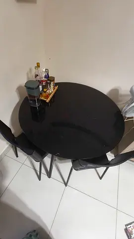 Black glass top round dining table with 2 chairs - compact set.