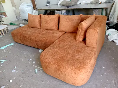 Large L-shaped Orange Fabric Sofa with Cushions