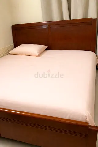 Pure wood king size bed and 2 side tables from ikea for sale