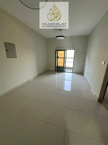 Al Jurf 2, next to City Centre Ajman, easy access to Dubai and Sharjah - Second occupant - One bedroom and living room with 2 bathrooms, balcony, and