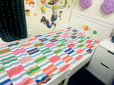 IKEA Busunge Kids bed adjustable to three different sizes with mattress