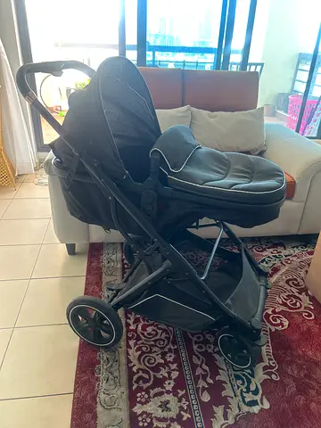 Good condition full-size baby pram stroller with bassinet