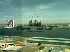 Resale of a one-bedroom apartment with a living room and two bathrooms in Orient Towers, Al Bustan.