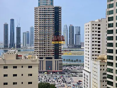 2 Bedroom Apartment for Rent in Al Majaz 3 with Direct Sea View over Al Qasba and Lake, Balcony, Parking and Full Facilities in a Prime Location