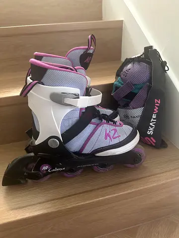 Kids adjustable inline roller skates with protective gear , K2