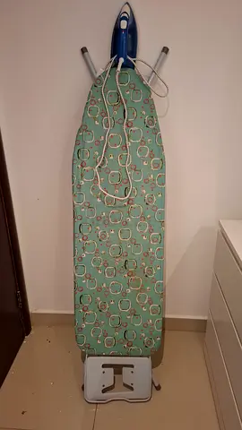 Ironing board with flat-iron