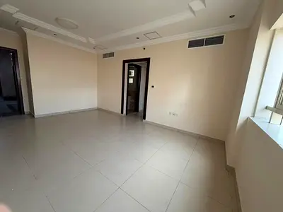 For rent: One bedroom and living room in Al Taawun, with parking and built-in wardrobes.