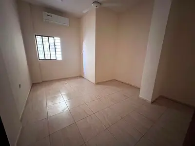 Ground floor studio apartment in Al Nakheel, second row from the Corniche. Separate kitchen with distribution area. Split air conditioning. Maintenanc