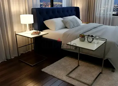 Italian Poltrona Frau top genuine leather and metal nightstands