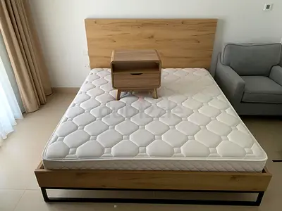 High quality Bed with mattresses Brand new condition with one side table
