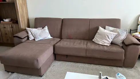 Brown L-shaped 3-seater pull out Sofa bed with storage and Ottoman - Good Condition