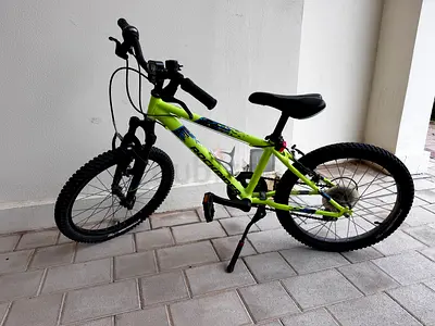 Green kids mountain bike - good condition