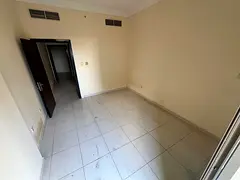 2BR Emirates City: 34K, Private Parking, Garden View, Direct Dubai Exit