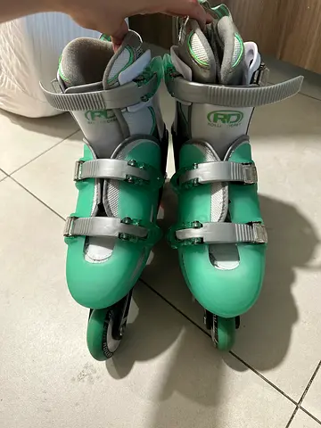 Mint green adjustable roller skates - adjustable size 36-39