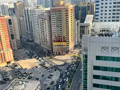 2BR in Al Taawun, parking, kitchen balcony, 2 master rooms, 3 baths, storage, open view, AED 56K.