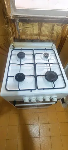 Used 4-Burner Gas Stove with Oven - Good Working Condition
