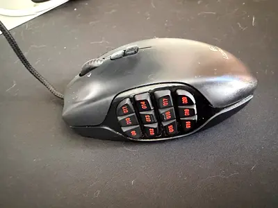Gaming Mouse G600 with 12 Side Buttons (new, used one time) still under the box