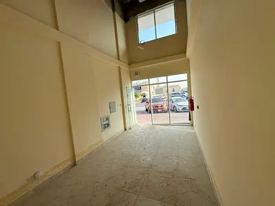 Commercial space for rent in Al Rawda 2 – Mezzanine, spacious, and prime location