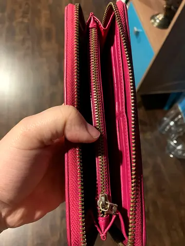 Pink zip-around long wallet with coin compartment - light usage