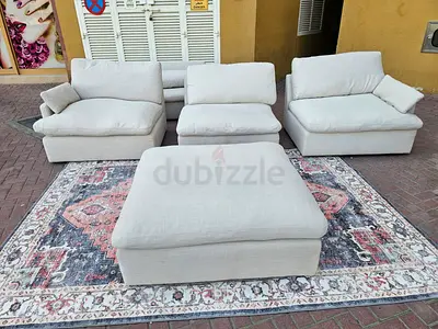 Swin feather 🪶 filled modular sofa with footstool
