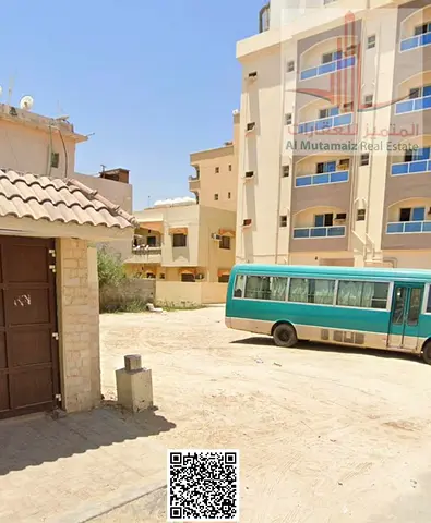 أرض سكني استثماري للبيع في النعيمية عجمان شارع وسكة تصريح أرضي + 4 بسعر مميز
