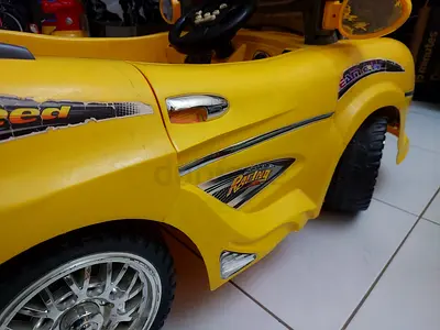 Used Yellow Ride-On Battery Toy Car
