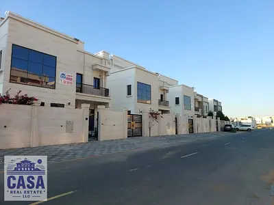 Villa for sale in Ajman, Al Zahia area, 7 bedrooms, 6 bathrooms, and 2 living rooms with a modern d