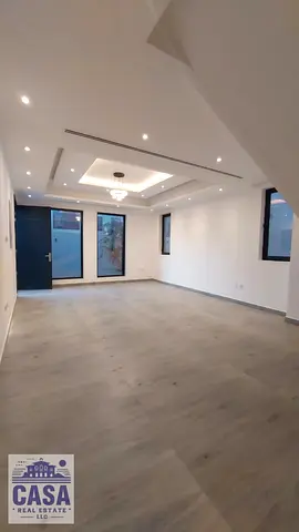 Villa for sale in Ajman, Al Zahia area, 7 bedrooms, 6 bathrooms, and 2 living rooms with a modern design.