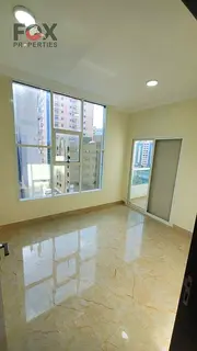 One-bedroom apartment with a living room for annual rent in Al Nuaimiya 1 area, balcony with an open