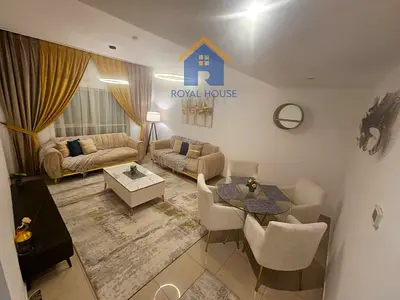 Two bedrooms with parking space for sale in Al Khan