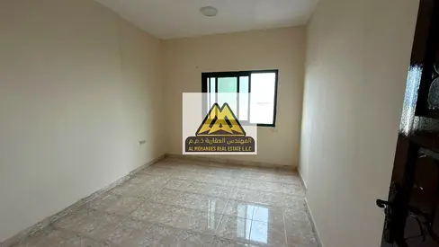 Two bedrooms and a living room with a direct sea view, first row on Ajman Corniche, for only 34,000 AED, close to all services.