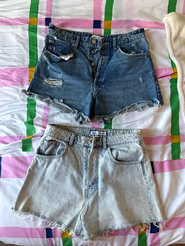 Two pairs of denim shorts (light and dark) - size 42