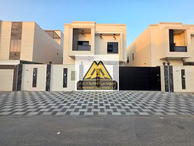 Al Zahya, Ajman, brand new and first occupancy, featuring a unique modern design and high-end finishing. The villa is located in a prime area directly