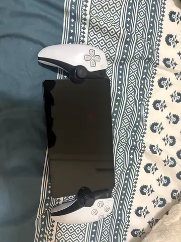 PlayStation 5 DualSense Controller Grips (paired on display) - Good Condition