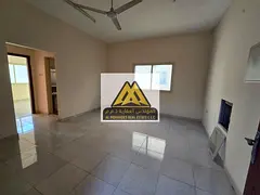 1 bedroom and living room apartment for annual rent in Al Alia, Ajman, large space, split AC, balcon